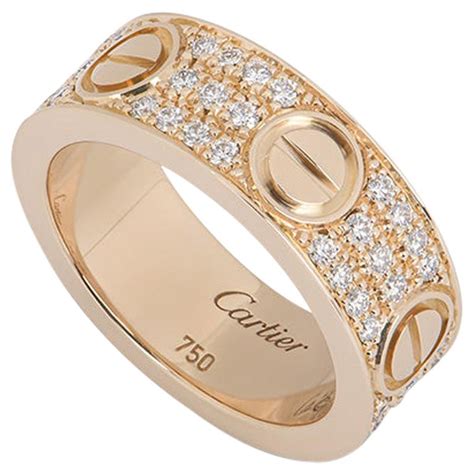 Cartier love ring with diamonds. When the Juste un Clou bracelet was created in 1971 at Cartier New York, it was known as the Nail bracelet. The bracelet returned in the 2000s, when its pure lines earned it the name Juste un Clou. Today the collection exists in yellow gold, rose gold and white gold, in both paved and non-paved designs. It also incorporates rings, brooches ... 