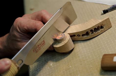 Carving the scroll - How to make a violin: in pictures