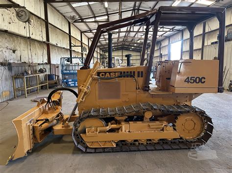 Case 450c weight. Dimensions & Tracks. Weight. 14170 to 14650 pounds. 16-inch tracks. Full dimensions and tracks ... John Deere 450C attachments. blade. Attachment details ... 450C Serial Numbers. 