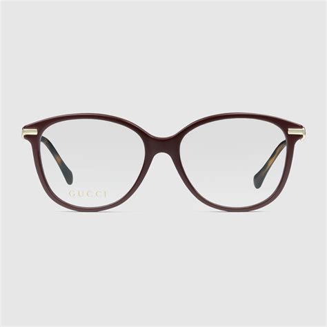 Cat eye optical frame in black and gold acetate GUCCI® US