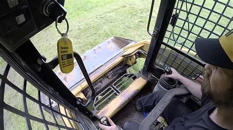 Cat skid steer controls. Kevin Coleman, Caterpillar Product Specialist for the Skid Steer, Multi Terrain & Compact Track Loader Group demonstrates the new hand and foot controls 