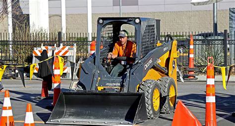 Cat skid steer driver alert.  The operator should stop the machine immediately and perfor...