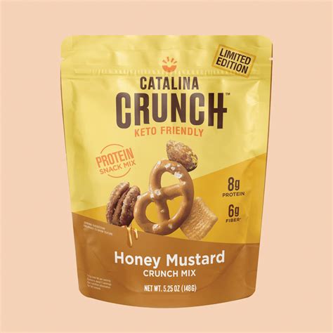 Catalina crunch honey mustard. Fat 5g %24. Saturated fat 0.5 g. Protein 11g %52. Carbohydrate 14g %24. Fiber 9 g. Ingredients: Catalina Flour (Pea Protein, Potato Fiber, Non-GMO Corn Fiber, Chicory Root Fiber, Guar Gum), Tapioca Flour, Organic High Oleic Sunflower Oil. Taste: A crunchy cereal with a light syrupy taste, the flavor was pretty weak. 