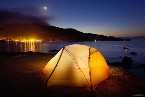 Catalina island camping. description: An upscale touristy village on a small rugged island - located off the coast of Southern California. Requires boat or air plane transportation to ... 