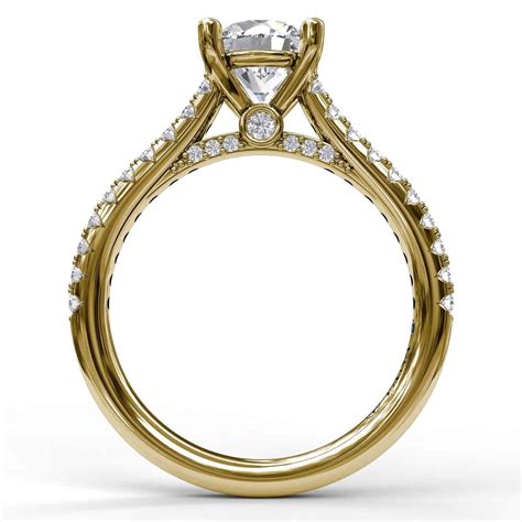 Cathedral ring setting. Ten round cut diamonds are channel set in this yellow gold engagement ring with cathedral setting, accenting your choice of center diamond. Approximately 1/2 carat total diamond weight and proudly made in the USA. Our Price: $1,715. Buy in monthly payments with Affirm on orders over $50. 