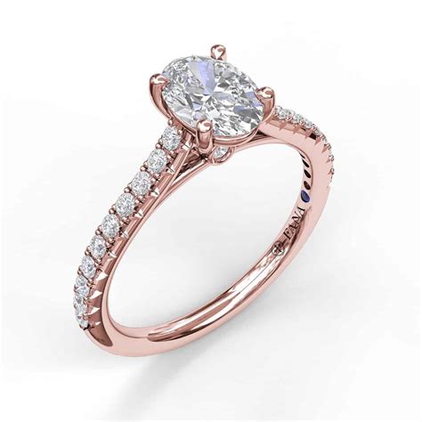 Cathedral setting engagement ring. Often we find ourselves following traditions without actually knowing where these traditions started and why we take part in them. Engagement rings are a common tradition that few ... 
