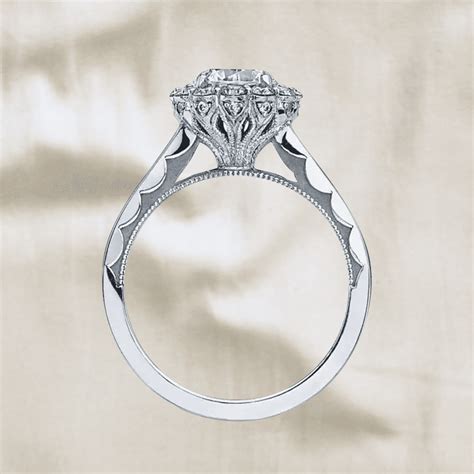 Cathedral setting ring. A cathedral setting adds height to a ring and makes the center stone appear larger. This type of setting does have drawbacks, though, as the wearer risks getting it caught or snagged. Bar Setting. A bar setting is quite similar to a channel setting, but doesn't close the diamond in on all sides. A bar setting leaves the diamond … 