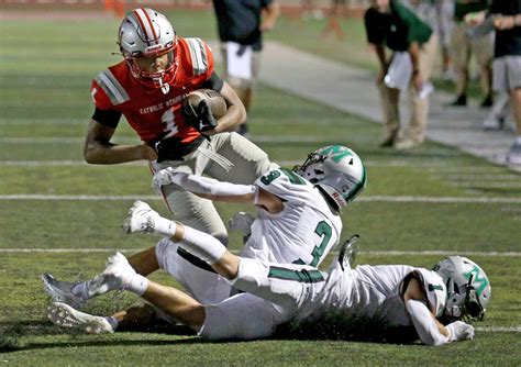 Catholic Memorial strikes early and often, routs Mansfield in opener, 41-14
