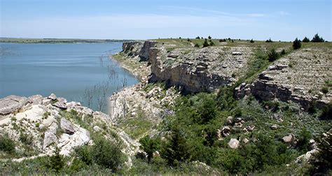 Cedar Bluff State Park is a state park in Trego County, Kansas, United States. It is located 21 miles (34 km) southeast of WaKeeney and 23 miles (37 km) southwest of Ellis. The park is divided into two areas, comprising 850 acres (340 ha), straddling the 6,800-acre (2,800 ha) Cedar Bluff Reservoir. The Bluffton Area—300 acres (120 ha) on the north shore—is the …. 