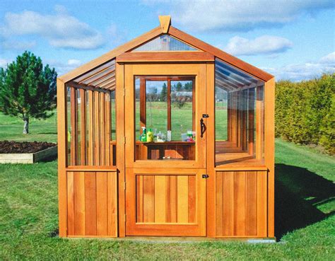 Cedar built greenhouse.  The double-wall polycarbonate windows allows lots of sunlight th...