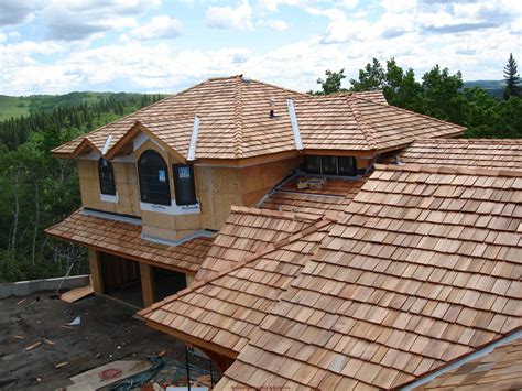Cedar shake roof. Answer, $31,500 to $42,000. You could choose a standard grade, 24” medium hand-split shake that costs $200 per square (material) or a heavy hand-split, treated ... 