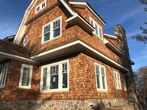 Cedar shingle siding. Achieve the classic appeal of brand new eastern white cedar shingles. Sandcastle looks stunning on full walls and entire homes, and can also be used to brighten and accentuate architectural details such as gable ends. Its simple beauty will last for the life of the home. 
