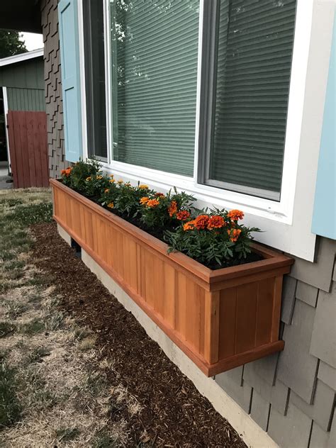 Cedar window boxes. Cedar window boxes are a perfect accent to almost any home. While they provide a functional space for flowers, the character of the cedar wood holds a beauty all its own. You can choose to paint them, or leave them naturally colored. Either way, we will apply a UV and water resistant coating to hold its color and help 