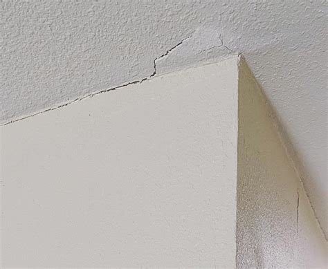 Ceiling cracks. Web-like cracks in the ceiling are typically an easier repair project as long as the cracks are only surface-level. The extra material will need to be sanded down so you can apply a new layer of plaster or putty. 6. Straight Separation. Straight cracks are a common sight on ceilings made with drywall panels. 