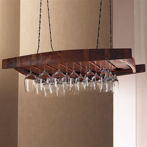 Ceiling hanging wine glass rack. The hanging wine glass storage rack will help you to organize and de-clutter your kitchen and display your stemware in your dining room to serve your guests more conveniently. Product Type: Wine Glass Rack; Furniture Design: Hanging; Material: Solid Wood; Stemware Capacity: 12; Overall: 0.6'' H x 10.9'' W x 1.6'' D 