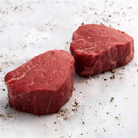 Center cut filet mignon. There are a few key differences when comparing filet mignon and ribeye, with the part of the cow in which the cuts come from being one of the main distinctions. Cut of meat: Ribeye comes from the section of a cow's rib cage that covers ribs six through twelve, while filet mignon comes from the tenderloin. Texture: Filet mignon and ribeye … 