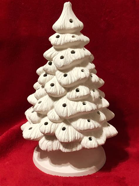 Ceramic christmas tree molds. Large Vintage Atlantic Mold Ceramic Christmas Carolers, 3 pc Set, Unique, MCM Holiday Figurines. (102) $59.99. Vintage Ceramic Christmas Tree '72 Divided Serving Tray Atlantic Mold Candy Dish. Splatterware. EUC. 15"x12". 