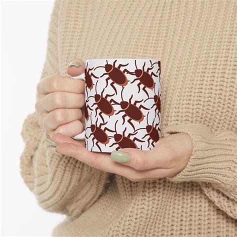Ceramic cockroach coffee cup.  With an "I Love Cockroaches" design, ...