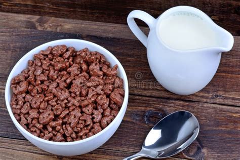 Cereal Letters in a Ceramic Bowl with Milk on Table Stock Photo Image