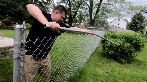 Chain link fence repair. Is your fence or gate in need of repair your chain? Call Northwest Chainlink today to get your fence looking new again. A Chain Link Fence Is Surrounded by ... 