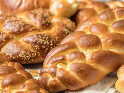 Challah braids. Challah is a loaf of leavened, braided egg bread that is traditionally consumed on Shabbat in Jewish communities, although it is also popular on festive occasions such as weddings or brit milahs. Less common varieties of challah are not braided, but shaped into spirals, books, keys, and flowers. 