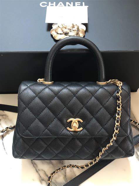 Chanel coco handle bag. In today's video, I am sharing my first impressions and review on my beautiful Chanel Coco Handle in the Medium size and what fits inside. I am thrilled I ch... 