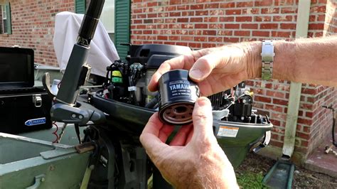 Changing the oil in a four stroke outboard - YouTube