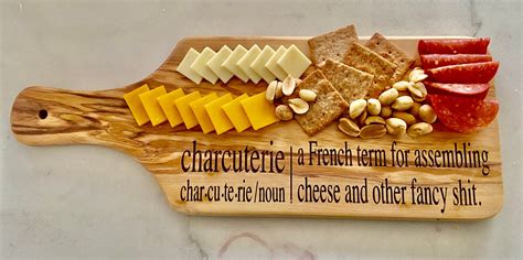 Check out our charcuterie puns selection for the very best in unique or custom, handmade pieces from our cheese & charcuterie boards shops.