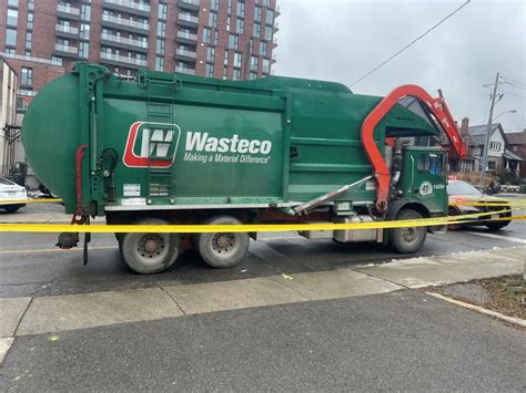 Charges laid after woman struck and killed by garbage truck in St. Clair Village