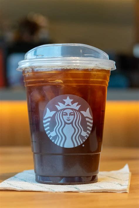 Cheapest drink at starbucks. 1. Caffè Americano – 0 grams. An Americano is as simple as it gets as far as coffee orders go, with only two ingredients, espresso, and water. With 5 calories and no sugar, this is an excellent option for a midday pick-me-up and is certainly a top low-sugar Starbucks coffee drink! 