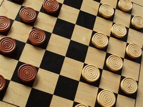 FEATURES. Four computer difficulties to play checkers against. Pass-and-play two player checkers. Three board sizes: 8x8, 10x10, or 12x12. Four fun board themes to choose from. Show Moves, Hint, and Undo options ….
