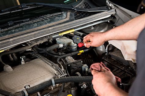 Checking transmission fluid level. You check your engine oil between services – or at least, you should. You’re looking for the proper level and condition, and if there are any signs of a problem, you change the oil. … 
