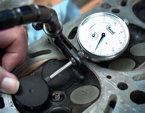 Checking valve stem to guide clearance. - 2015 kawasaki ninja zx10r manuale di servizio.