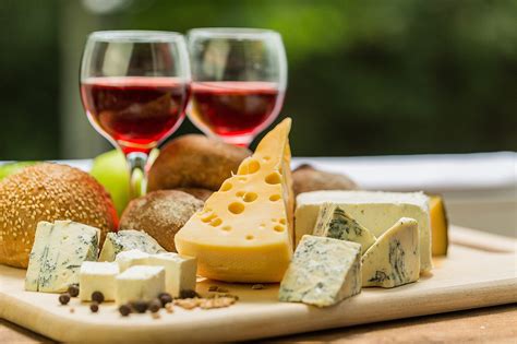 Cheese and wine. In the world of food pairings, cheese and chocolate probably aren't the first thing that comes to mind. Both are often paired (separately) with wine; cheese and beer are also a tried-and-true ... 