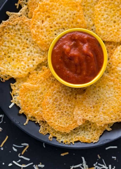 Cheese chips. Microwave on high for 1-1.5 minutes, watching closely near the end, until the cheese and pepperoni are nice and crispy. Oven Instructions: Preheat your oven to 400F. Line a baking sheet with parchment paper. Add the cheese in small piles on top of the parchment paper, about 1 tablespoon each, with a little space between. 