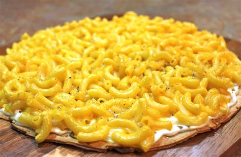 Cheese macaroni pizza. Preheat the oven to 350℉ and spray a 9×13-inch baking dish with cooking spray. Set aside. Bring a large pot of salted water to a boil. Cook the pasta a few minutes less than al dente. About 8 minutes. Drain and rinse with cold water, and set aside. Heat the olive oil in a large skillet over medium heat. 