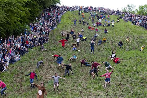 Cheese race. Cheese Rolling. Cheese rolling is a high-risk* sport which involves chasing a high-speed wheel of cheese at breakneck speed down a very steep hill in one specific … 