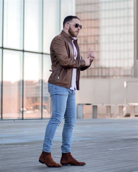 Chelsea boots and jeans. A light-colored Chelsea boot like this always looks great with either light or dark-wash jeans. Finish the look with a wool coat or a classic denim trucker jacket . Blundstone #550 Chelsea Boots, $210 