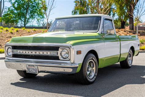 This 1970 Chevrolet C10 Custom pickup was acquired by the seller in 2020 and modified in 2022 with work that included fitting a wrecker bed from a 1960s truck over a custom rear frame section in addition to overhauling its 350ci V8, reupholstering the interior, and overhauling the suspension. The truck features rear air-ride helper springs .... 