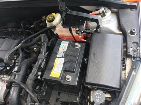 2018 Chevrolet Cruze: Step-By-Step Jump-Starting Instructions. The positive jump start connection for the discharged battery is under a cover. Remove the cover to expose the terminal. 1. 12-volt ... 