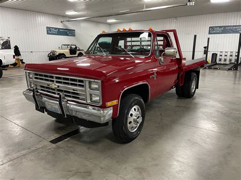 Chevy k30 dually flatbed. 1986 Chevy K30 1 Ton Dually Flatbed. Condition: Used; Make: Chevrolet; Model: K30 Pickup; Type: Standard Cab Pickup; Year: 1986; Mileage: 179,534; VIN ... Description **Please read description all the way through before bidding!**Up for sale is an '86 K30 Flatbed truck! This truck is a dually but has a single set of wheels on the rear axle ... 