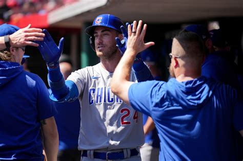 Chicago Cubs let a doubleheader sweep slip out of their hands and settle for a split against the Cincinnati Reds