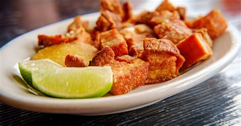 Chicharrons. To assemble the chicharron en salsa: In a large saute pan, add some oil and heat on medium-high heat. Saute the onions, green onions and garlic. Add the chicharrones and mix together. Add equal ... 