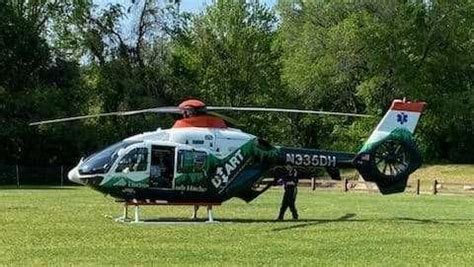 Child taken to hospital by medical helicopter after falling into outdoor cooking fire