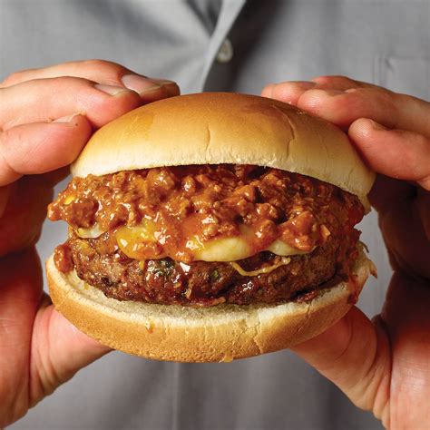Chili burger. Learn how to make juicy burgers with chili powder, canned chili and cheese, topped with french-fried onions. This easy and delicious sandwich is perfect for a weeknight meal. 