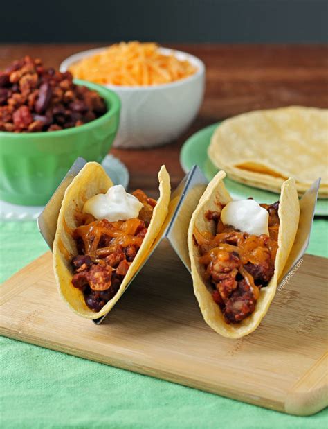 Chili tacos. Directions. Place a heavy pot over medium heat. Add onions and ground beef and cook and stir until beef is browned and crumbled and onions begin to turn translucent, about 5 minutes. Drain grease from pot. Pour in beef broth; add beans, tomatoes, corn and Knorr® Fiesta Sides - Taco Rice. Stir in 1 buttery spread. 