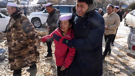 China’s earthquake survivors endure frigid temperatures and mourn the dead