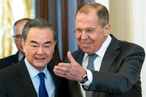 China’s foreign minister holds talks in Russia after meeting with US national security adviser