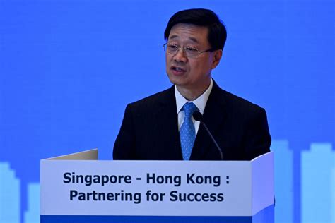 China demands US invite Hong Kong leader to economic meeting, adding to strains over crackdown