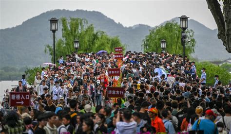 China tourists overwhelm attractions as travel explodes after COVID